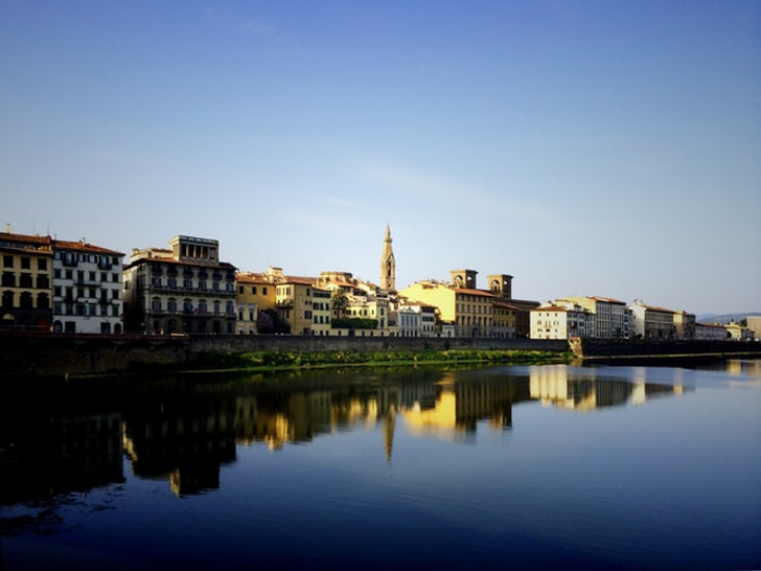 buildings reflected in water